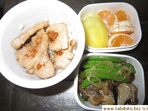 Panfried pork chop, stirfried sugar snap peas with straw mushrooms and shallot, mandarin and kiwi