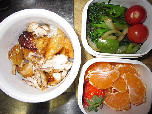 Grilled chicken wings, stirfried broccolini, onion and peppers, cherry tomatoes, fruit