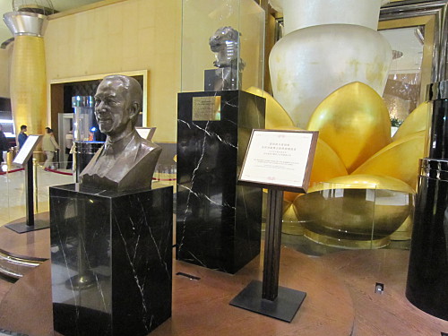 The bust of Lisboa's owner, Stanley Ho, is prominently displayed in the lobby. Behind it are the 218-carat diamond and