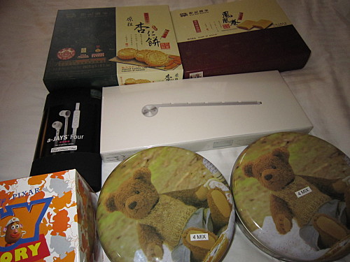 Koi Kei almond cookies, ear buds, key board and free mug from Broadway, cookies from Jenny's Bakery