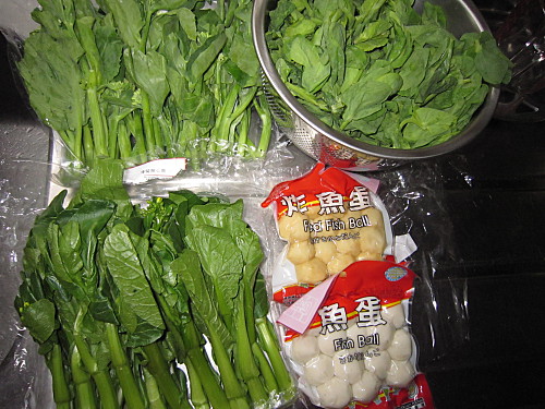 Couldn't resist bringing home some Chinese broccoli, choisum, pea shoots and fish balls from Wellcome supermarket