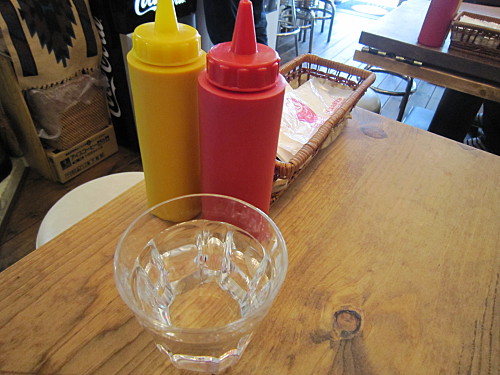 Mustard and ketchup on the table