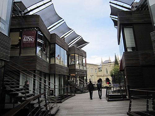 The complex across from the church houses restaurants