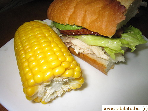 Dinner: chicken sandwich and corn