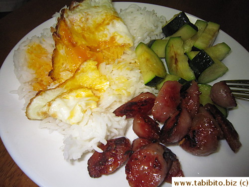 Runny yolk mixed with rice and slightly crispy Taiwan sausage equals BLISS