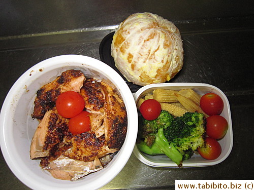 Grilled Cajun salmon, vegies, cherry tomatoes, orange