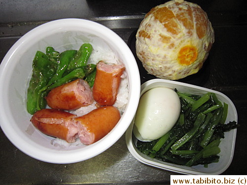 Sausages and shishito peppers, sauteed spinach, soft-boiled egg, orange