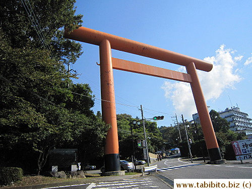 by first passing under this Torii gate and go up the road