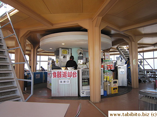 Mini revolving cashier section within the bigger revolving dining floor