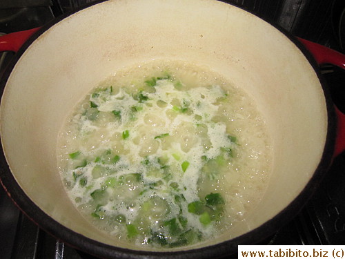 Cook some rice with chopped ginger and green onion