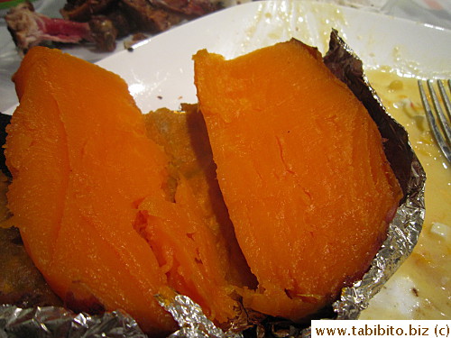 Moist and soft sweet potatoes cooked on the coal