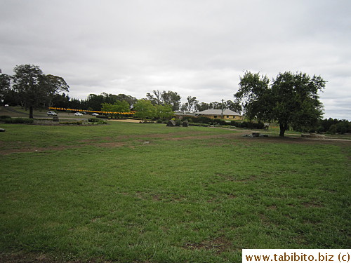 A lone house on the other side of this big piece of land