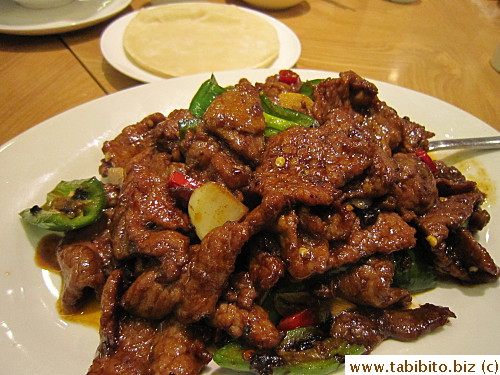 Spicy beef stirfry served with Chinese pancakes