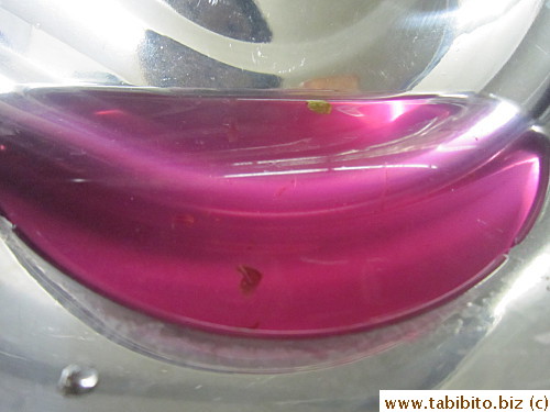 The cut stems bleed in soaking water