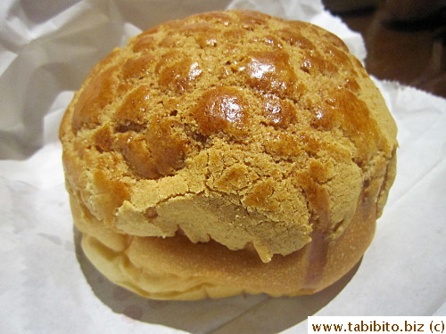We got a huge pineapple bun from them, twice the size of a normal one HK$10/US$1.3  The bun was buttery and the cookie part very crispy and hard