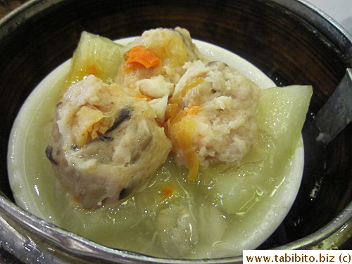 Some sort of pork dumpling over fuzzy melon