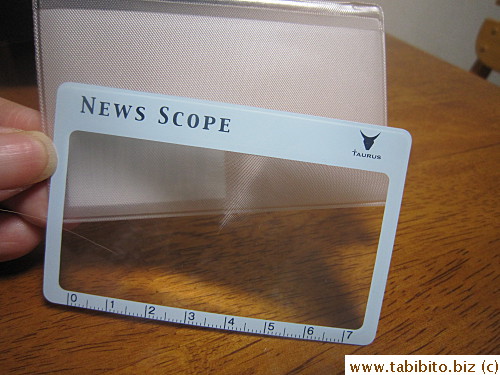 Magnifying glass the size and thickness of a name card, very handy for reading menu!