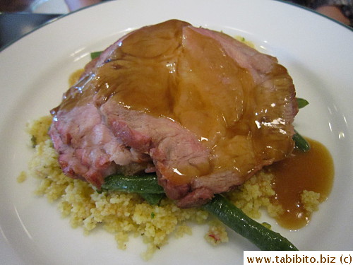 Lunch special: roast pork on top of cous cous