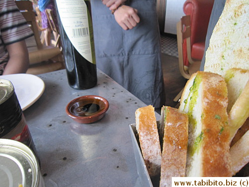 Our server and trainee poured olive oil and balsamic vinegar at the table