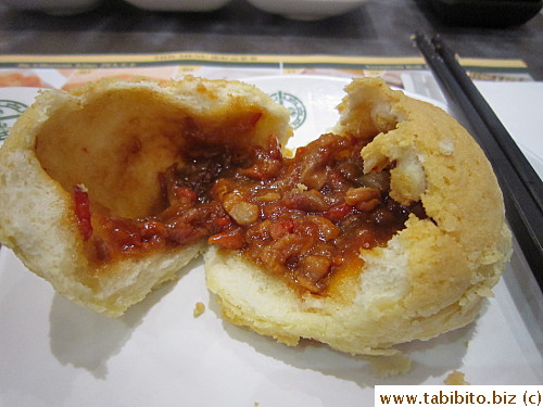 Oh my lord, so delicious!  It's a cross between a bun and a flaky pastry and the filling was so tasty, thumbs up up up