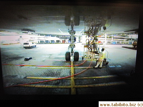 Camera under the plane enables us to see staff at work after landing