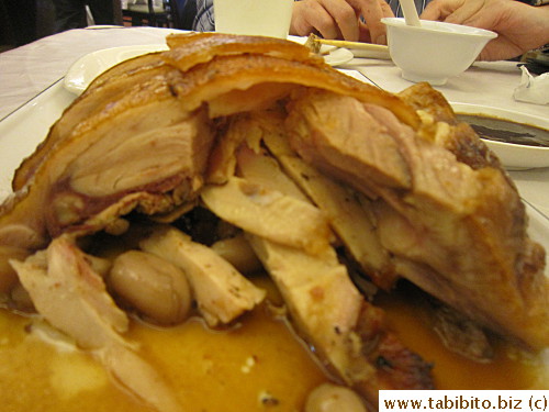 Suckling pig meat underneath crackly crispy skin