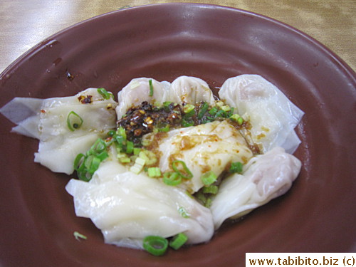 Spicy pork dumplings. Sauce was ok, dumplings not so much