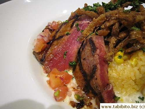 Steak tasted good and smoky but very tough