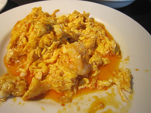 It was swimming in red oil that tasted like petrol/gasoline. We always try to finish our food, but we had to waste this inedible mess